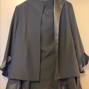 Two-piece suit. Lined, grey, beautiful, elegant.